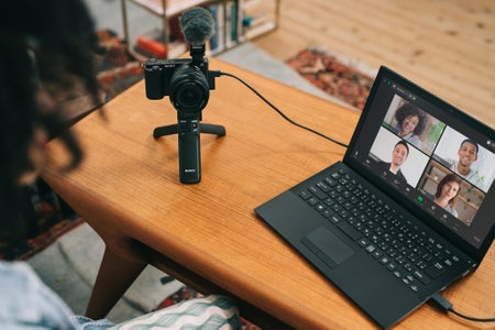 https://alphauniverseglobal.media.zestyio.com/Alpha-Universe-Alpha-ZV-E10BK_SEL1018_VPT2BT_tripod_online_communication.jpg?height=300&fit=bounds