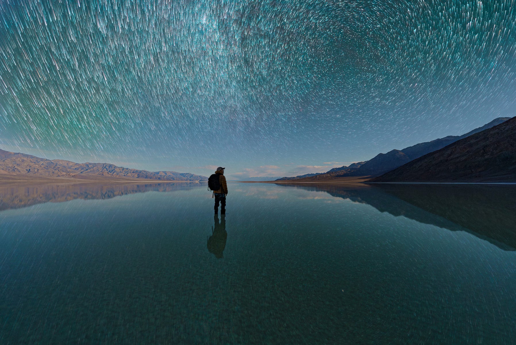 https://alphauniverseglobal.media.zestyio.com/Alpha-Universe-BTS-Stan-Moniz-Death-Valley-Star-Trail-Reflection-Final.jpg?height=1200&fit=bounds