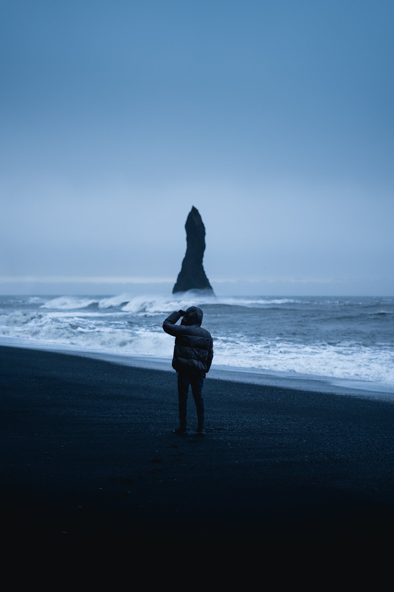 “Reynisdrangar Blue Hour, with a cloudy sunrise the light level was low, ideal for the f/1.8 of the 50mm.” Photo by Daryl Scott Walker. Sony Alpha 7 IV. Sony 50mm f/1.8. 1/250-sec, f/1.8, ISO 400