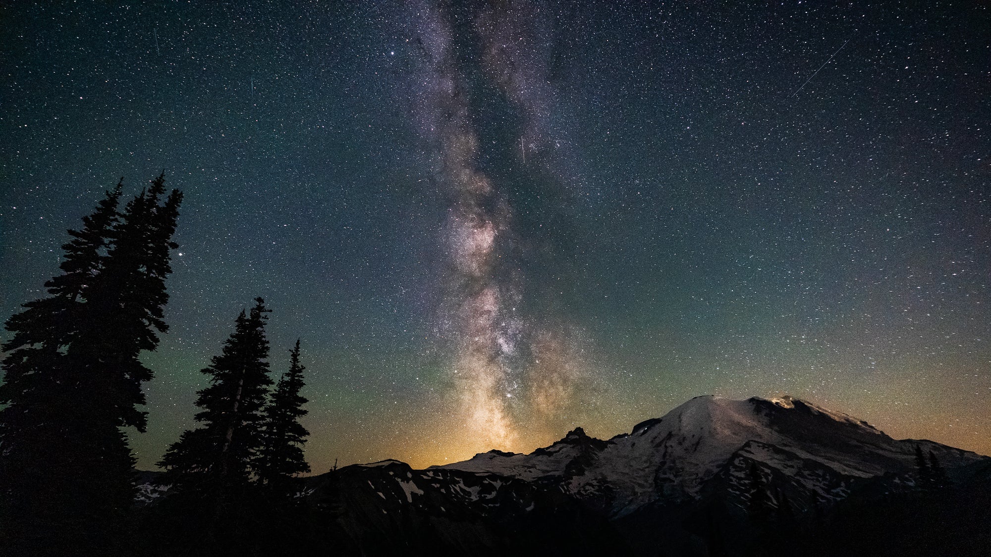 The core of the Milky Way setting behind Mount Rainier in Washington State. Photo by Dylan McMains. Sony Alpha 7 III. Sony 16-35mm f/2.8 G Master. 13-sec., f/2.8, ISO 12,800