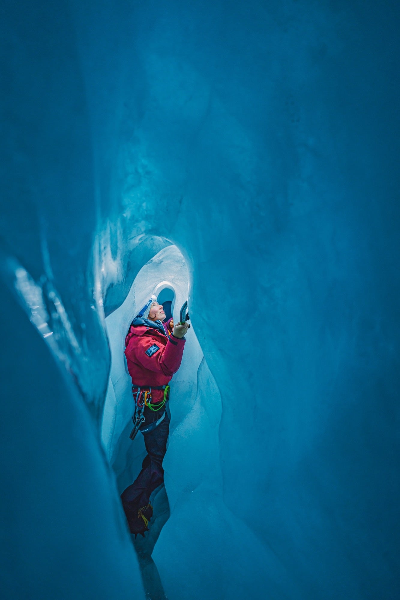 Climber in ice cave