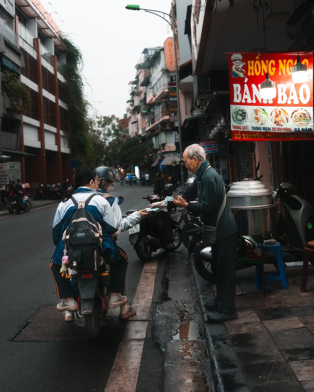 Two people talking on the street