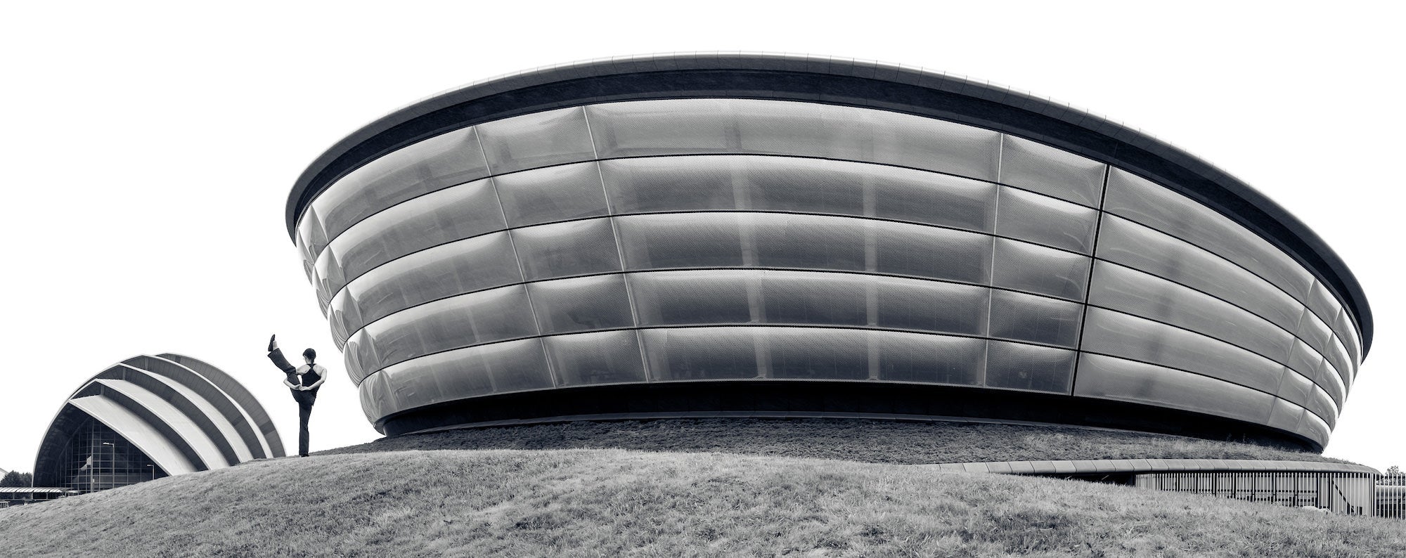 Woman doing yoga pose in Glasgow, Scotland Woman doing yoga pose in Glasgow, Scotland