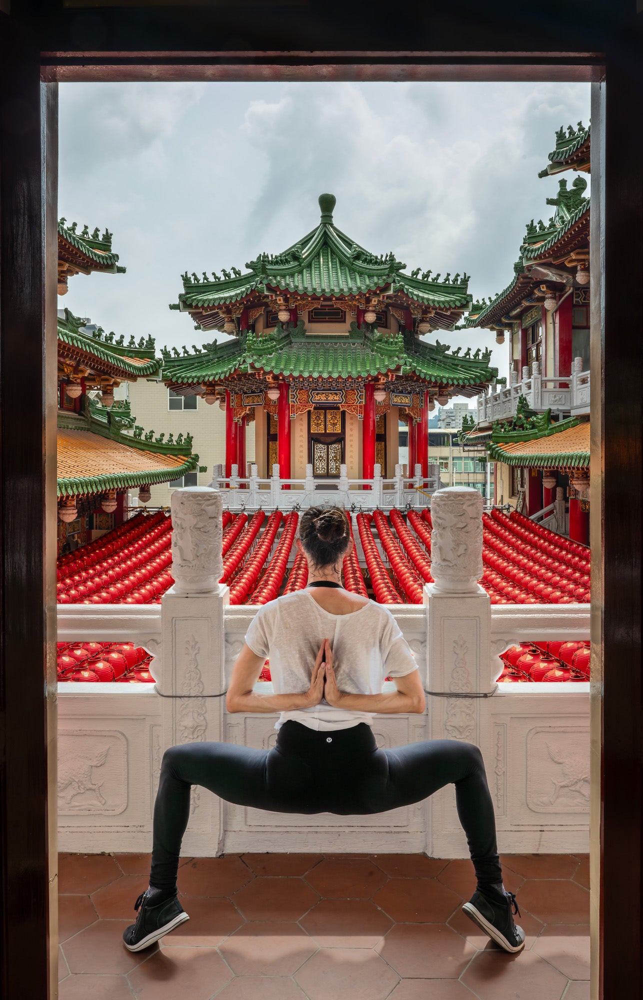 Woman doing yoga pose in Kaohsiung Taiwan Woman doing yoga pose in Kaohsiung Taiwan