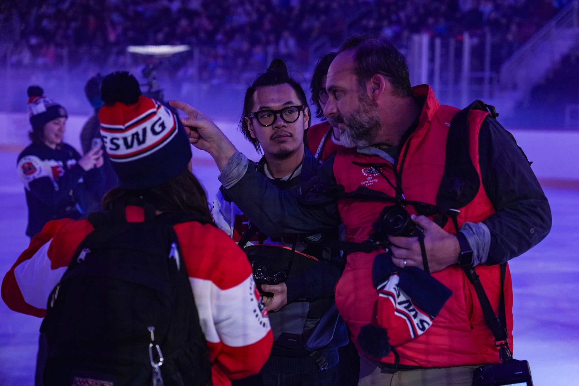 Professor leads student photographers on the ice.