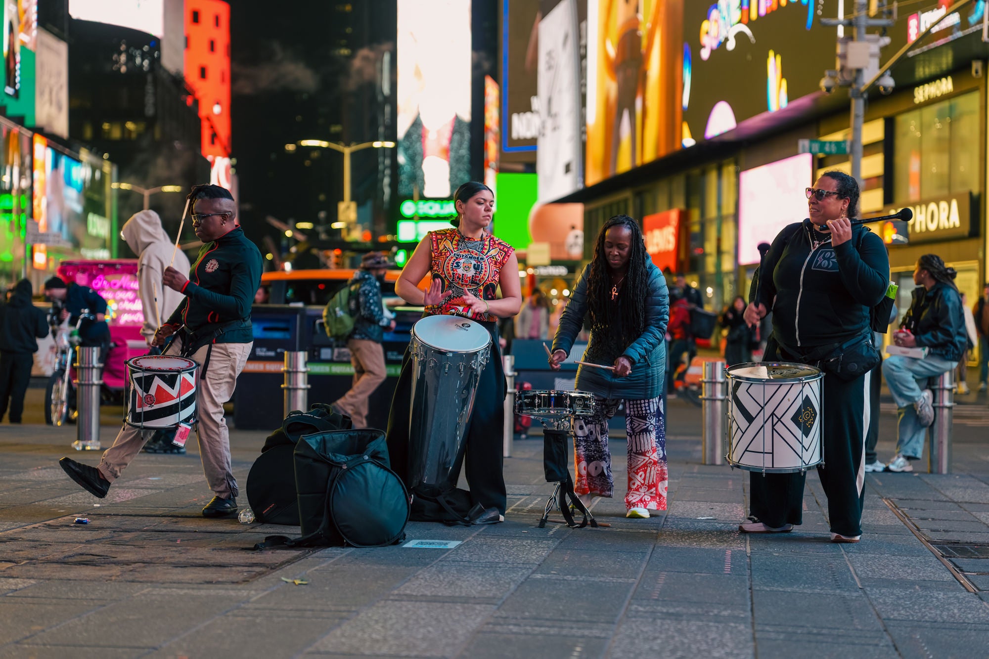 A street band plays in the middle of Times Square, NYC.