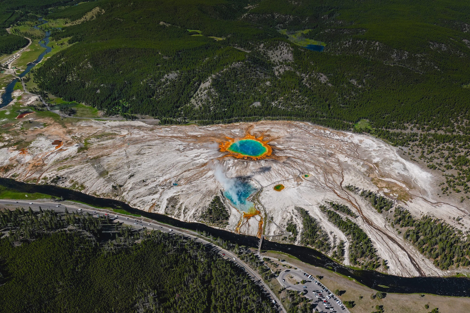 Aerial view of Yellowstone's Grand Prismatic Spring with its vivid rings of color and steam, shot with the Sony RX10 V by Dani Hamm.