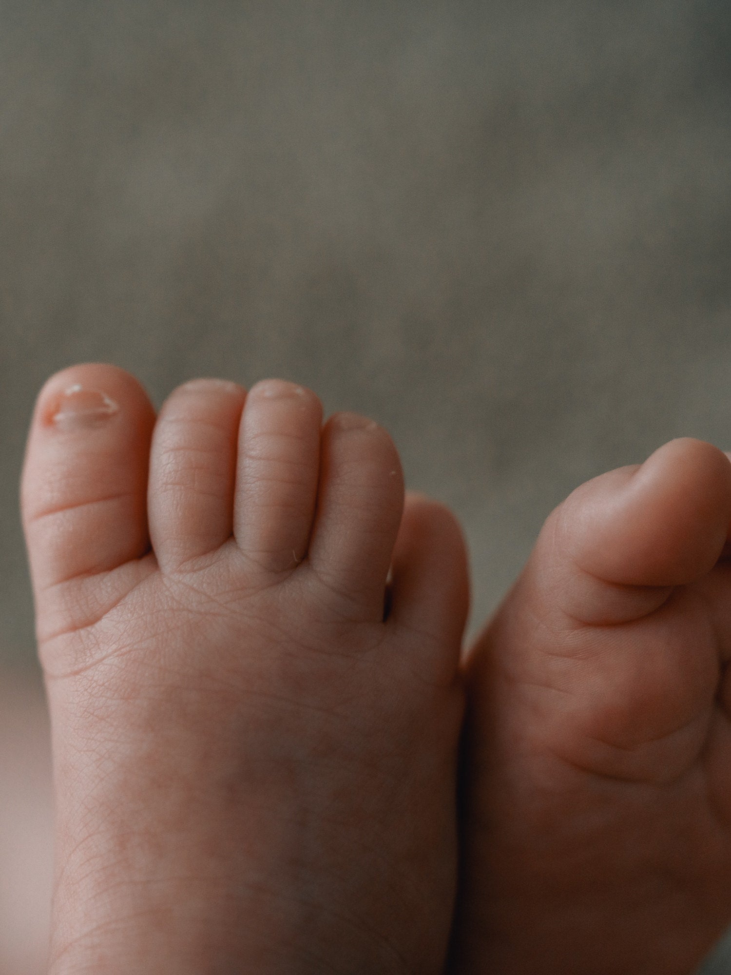 Close‑up of baby toes with soft skin texture.