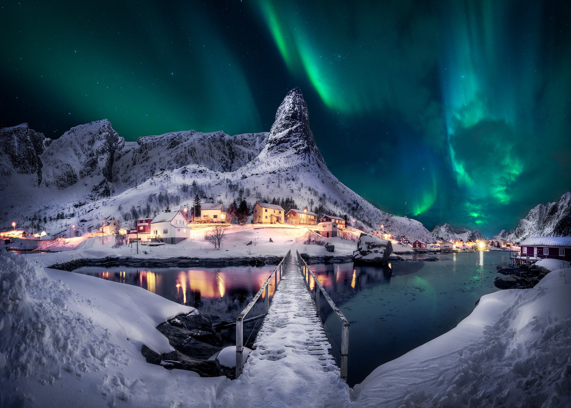 Northern Lights dance above Reine in Lofoten