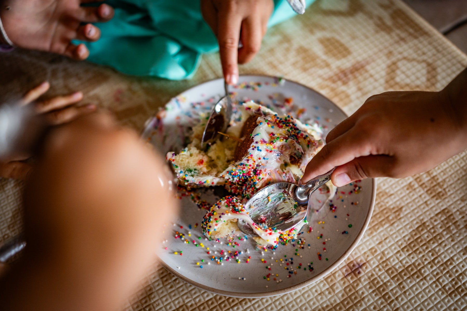 https://alphauniverseglobal.media.zestyio.com/birthday-cake-slice-sprinkles-kids-sharing.jpg.jpg?height=1200&fit=bounds