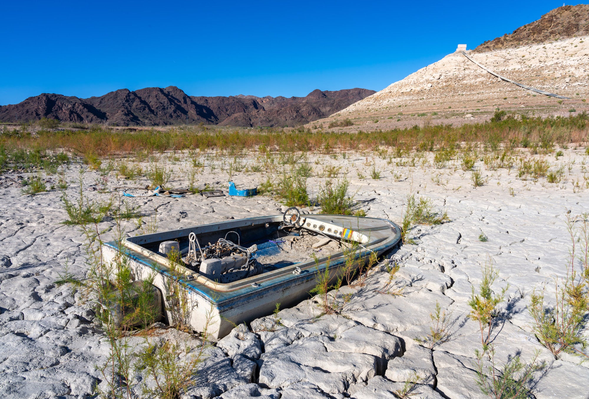Stranded boat and the retired Las Vegas intake at Lake Mead, stark evidence of drought and overallocation in the Southwest.